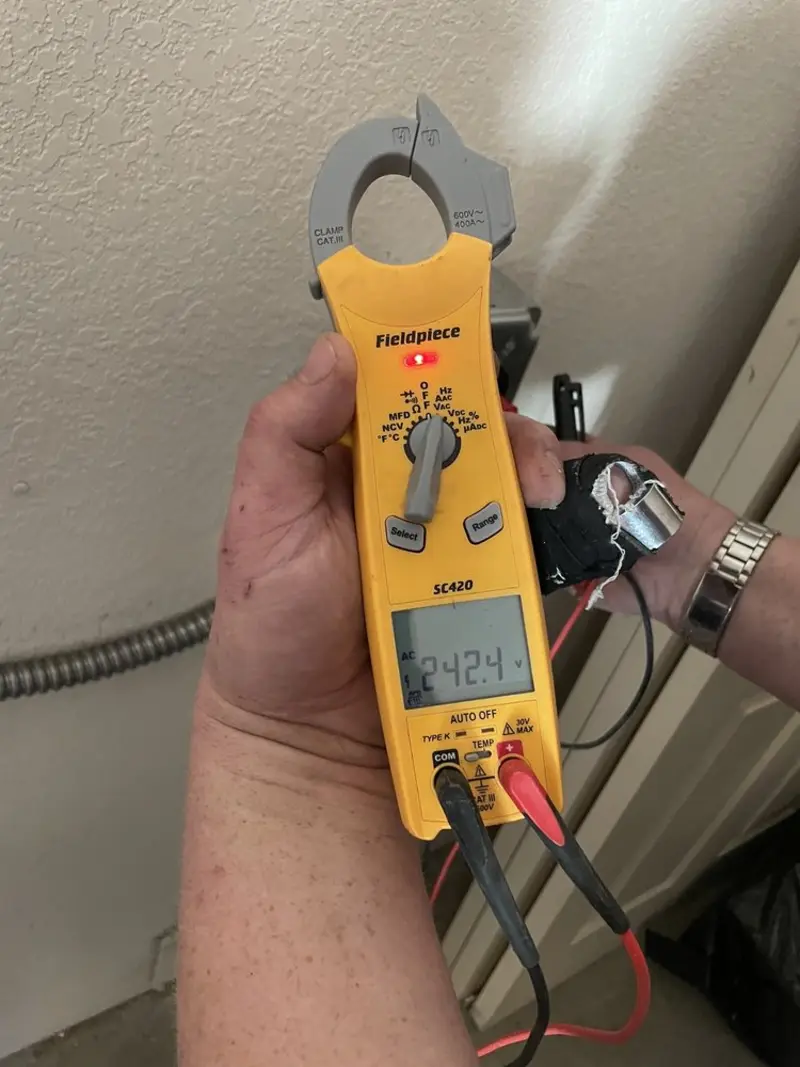 Voltage testing with clamp meter during Hot Tub / Pool Electrical Wiring in Choctaw